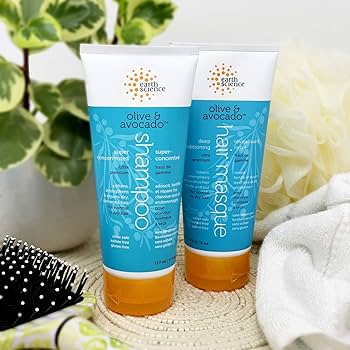 Earth Science Olive & Avocado Deep Conditioning Hair Masque jar displayed on a clean background, highlighting its nourishing and repairing hair care formula