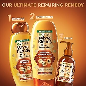 Alt text: Garnier Whole Blends Honey Treasures Repairing Shampoo with acacia honey, manuka honey and lavender for dry, damaged hair repair